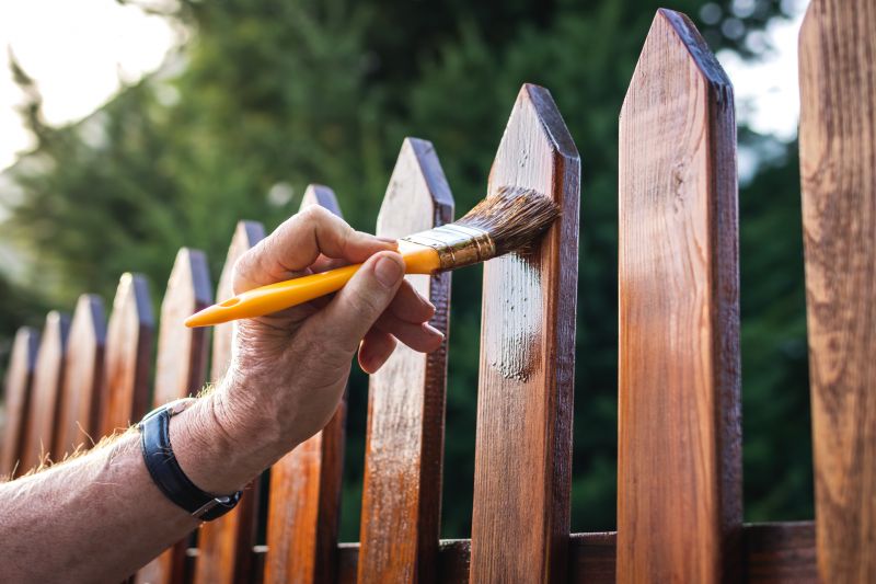 Local Fence Painting pros at work